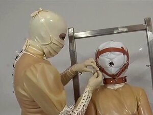 Bondage en caoutchouc, Vacbed, Veste hétéro